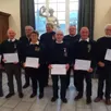 photo  les musiciens de la fanfare, après la remise de la médaille d’honneur des sociétés musicales et chorales, pour plus de vingt ans de service. 