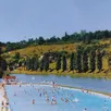 photo  la piscine de 125 m de long par 25 m de large avec sa plage de sable fin a ouvert le 28 juin 1974. 