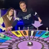 photo  trélazé, boulevard dautel, le 16 février 2026. rémi buge et mathilde tardy devant la fameuse roue du jeu roue by cube. 