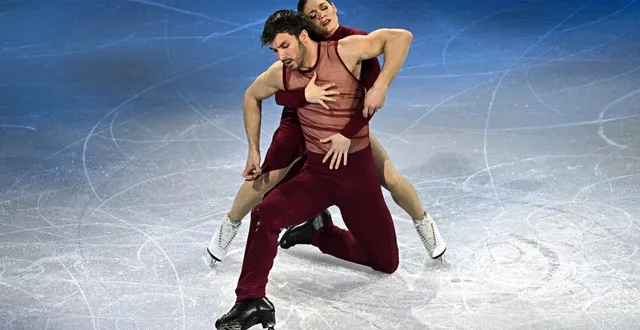 photo  laurence fournier beaudry et guillaume cizeron ont enchanté la patinoire de milan lors du gala d’exhibition, samedi 21 février.  &copy;  gabriel bouys / afp 