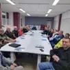 photo les représentants des clubs de l’omnisports de la patriote de bonnétable entourent les membres du bureau récemment réélu.