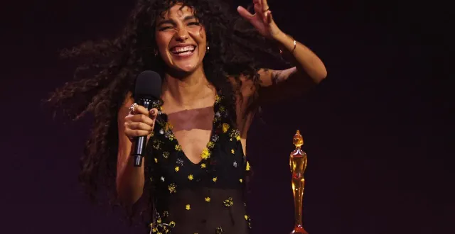 photo  olivia dean reçoit le prix de l’album de l’année lors des brit awards à la co-op live arena, à manchester, en grande-bretagne, le samedi 28 février 2026.  &copy;  reuters 