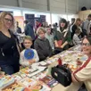 photo la ferté-bernard, samedi 7 mars 2026. à l’image d’anaïs et de son fils hugo (à droite) venus de bonnétable, le public est allé à la rencontre des auteurs du 16e festival du livre jeunesse.