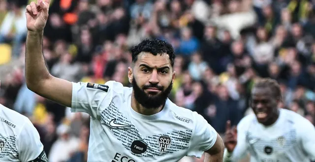 photo  amine sbai a offert le derby aux angevins.  &copy;  afp 