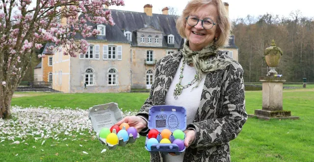 photo  nathalie lebreton, fille de la propriétaire du château de dobert, montre les œufs qui seront cachés dans une partie du parc.  &copy;  ouest-france 