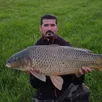 photo  tony a pêché une carpe de 18 kg. 