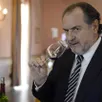 photo  french famous oenologist michel rolland smells a glass of wine, at the beausejour becot estate on april 2, 2014 in saint-emilion, during the 