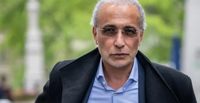 photo  tariq ramadan arrive au palais de justice de genève le 24 mai 2023 pour le prononcé du verdict de son procès pour « viol et contrainte sexuelle ».  &copy;  fabrice coffrini/archives afp 