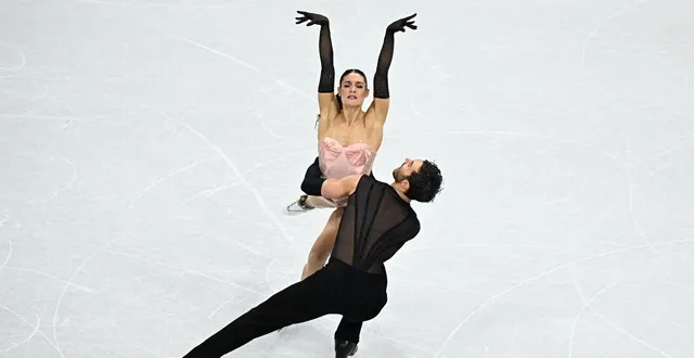 photo  laurence fournier-beaudry et guillaume cizeron ont frappé plus fort aux mondiaux qu’aux jo.  &copy;  afp 