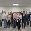 photo  brigitte têtu-edin entourée du conseil municipal.  