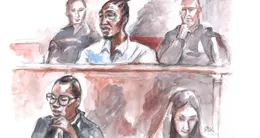 photo  l’accus�, ken jarny, jug� pour violences avec armes ayant entra�n� la mort, avec devant lui son avocate annick martial. 